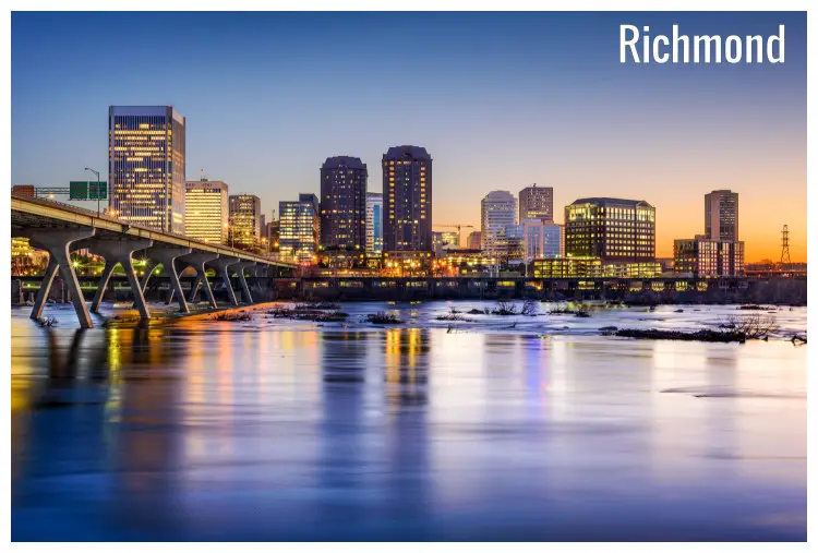 River James in Richmond, Virginia overlooking the lit city buildings at dusk River James in Richmond, Virginia overlooking the lit city buildings at dusk
