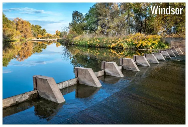 The stonework around the Cache la Poudre River dam section in Windsor, Colorado